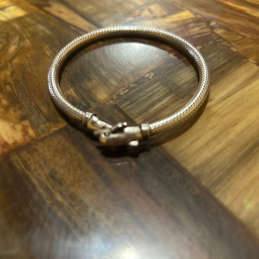 Sterling silver dolphin bangle